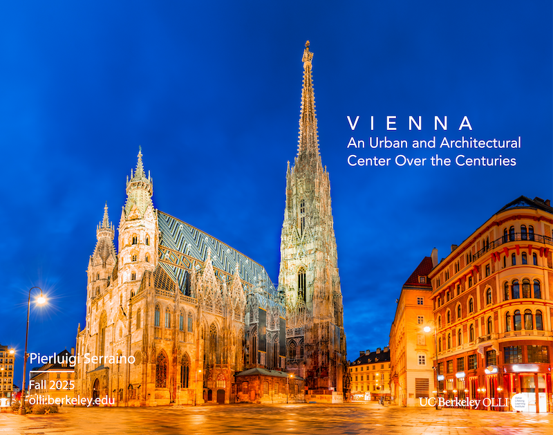 A lushly lit cathedral with dramatic spires against a deep blue night sky