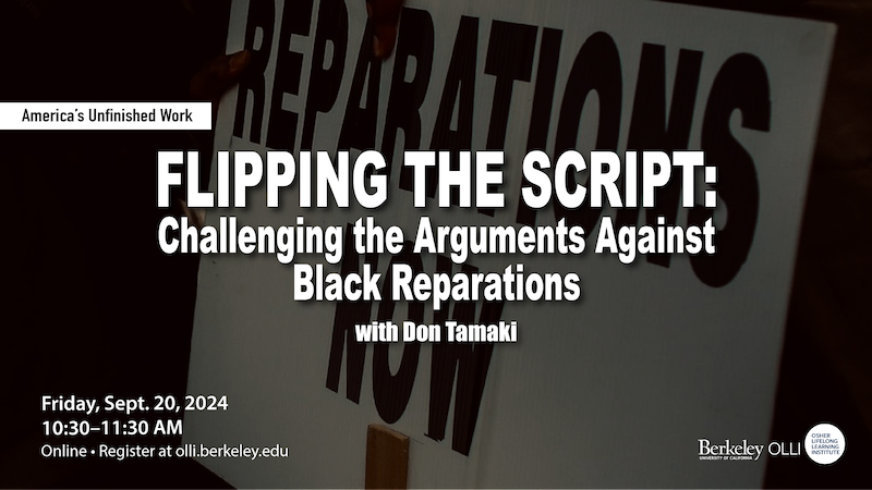 Closeup of black and white sign handprinted with word "reparations"