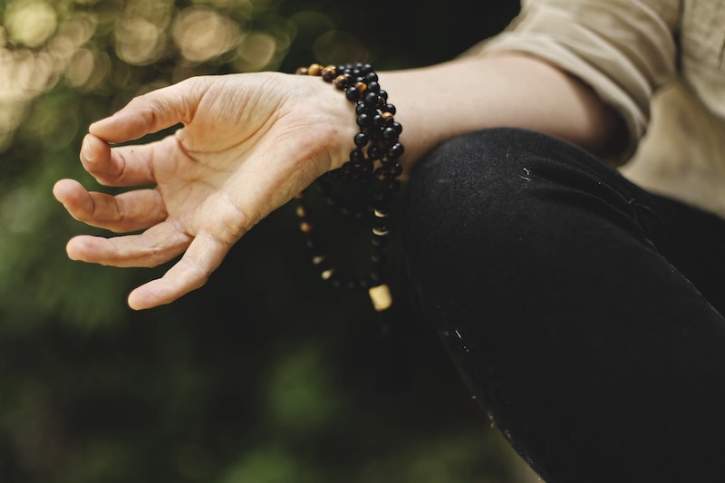 A hand in meditation pose