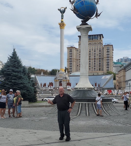 Michael Baker standing in Independence Square in Kyiv, Ukraine