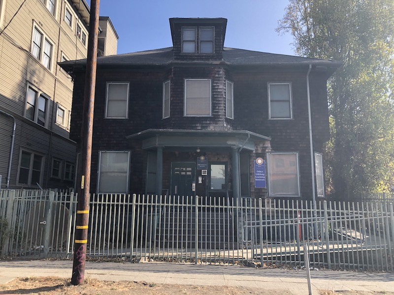 Weary brown-shingled Berkeley house 